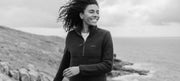 Model wearing a Finisterre recycled wool fleece